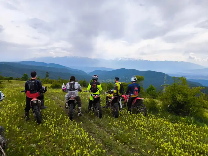 Off-road riding on a rocky mountain climb above Bansko